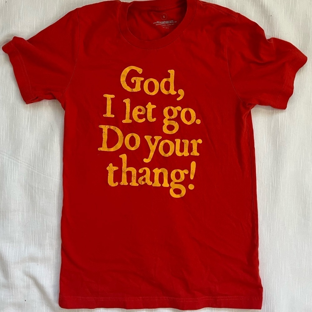 Small Red Beacon Threads shirt. The front says "God, I let go. Do your t…